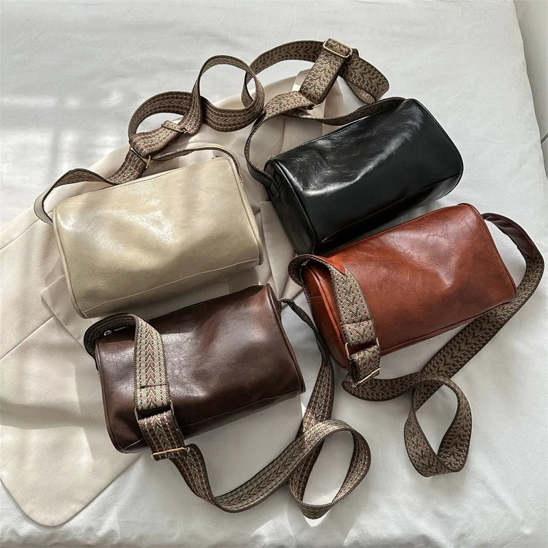 TRINE | VINTAGE LEREN CROSSBODY TAS MET VERSTELBARE RIEM